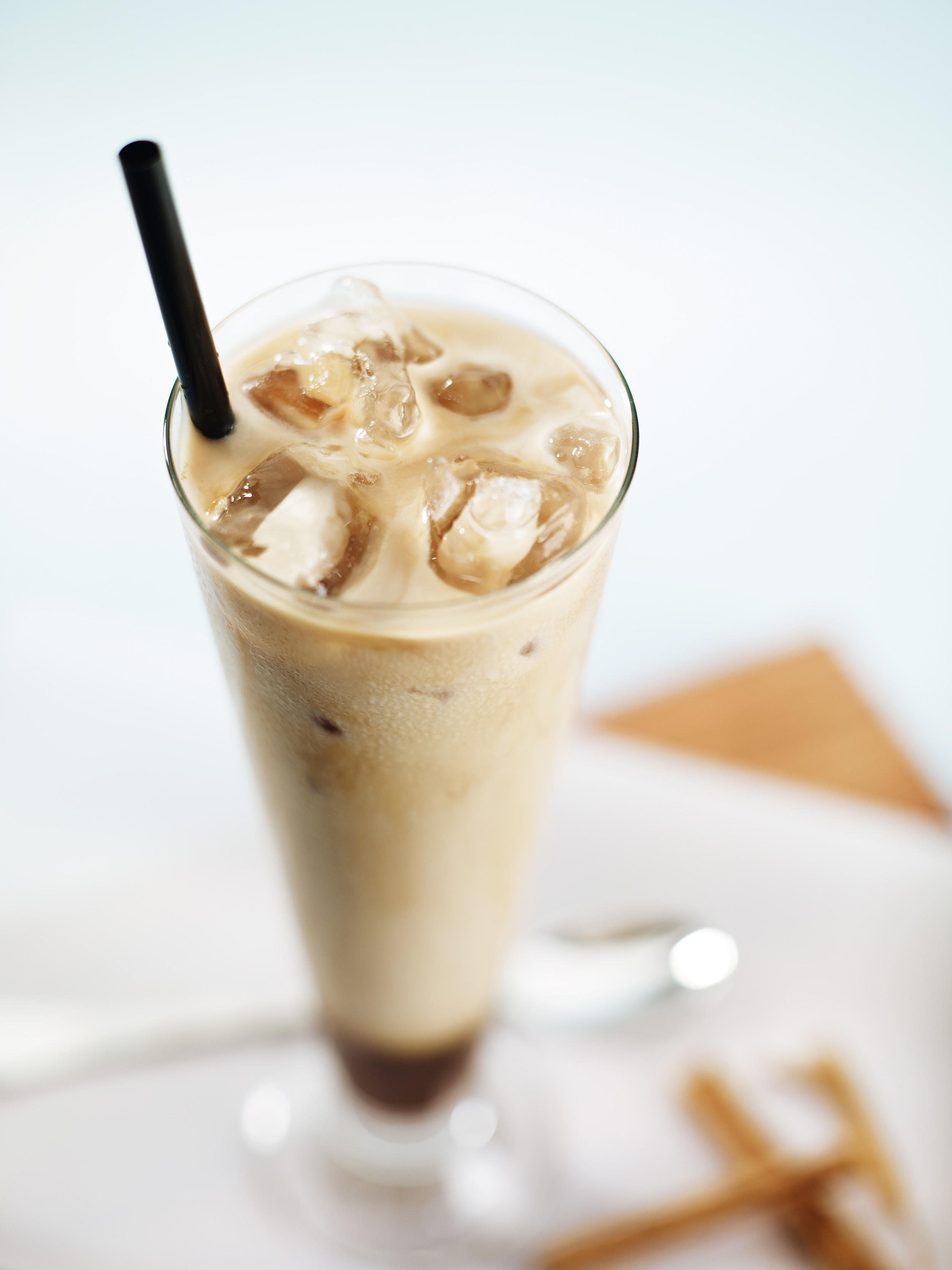 An iced latte in a glass. Paul Scott, food and drink.
